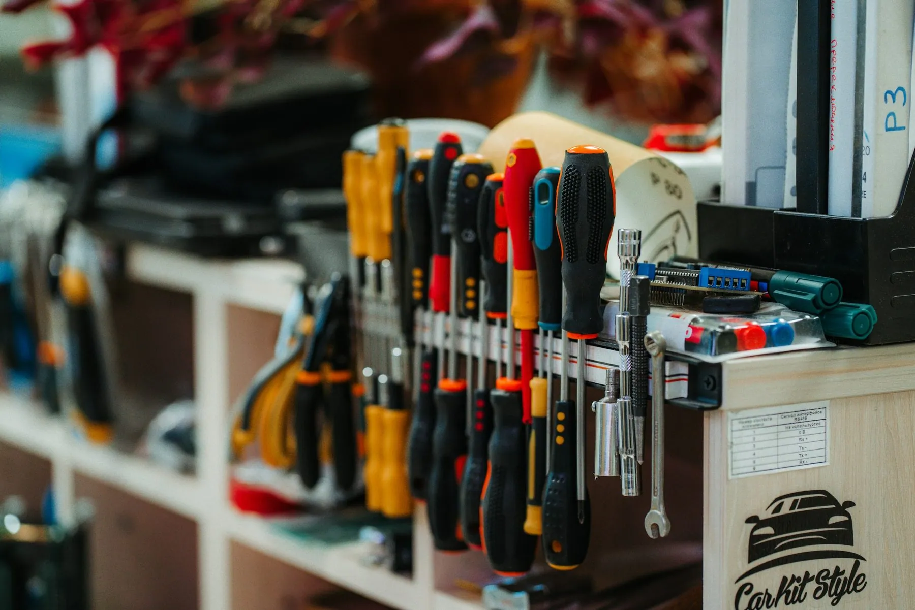 a bunch of tools that are on a shelf